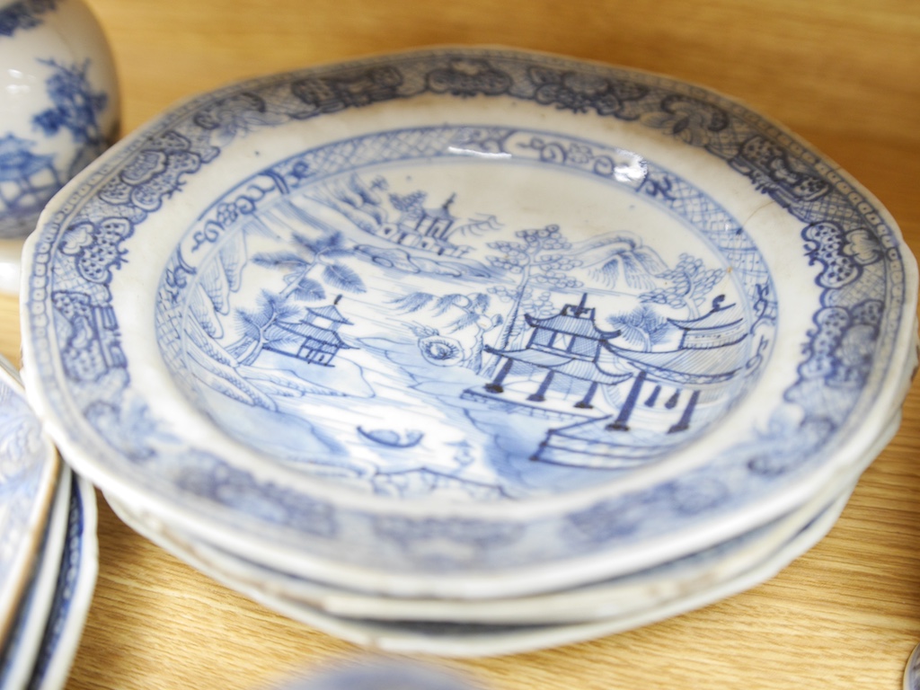 A group of 18th century Chinese export blue and white plates, two similar vases and a jug, largest 22cm wide. Condition - varies, some chipping and cracking